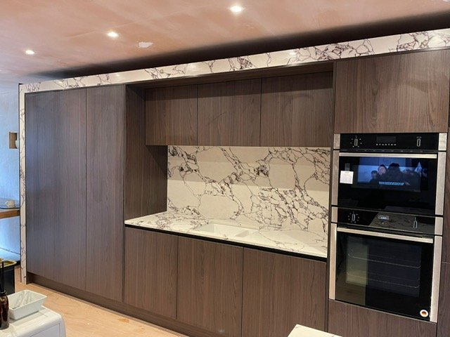 Modern kitchen installation with Rosa Bulgari quartz